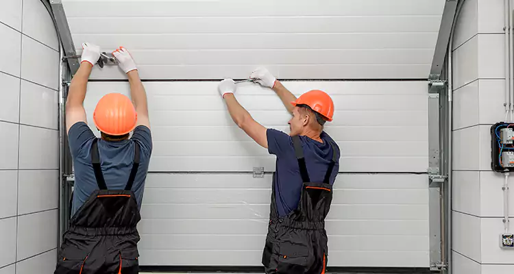 Garage Door Bottom Panel Repair in Ensley, FL